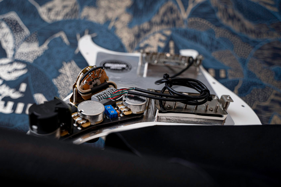 A fully loaded HH Stratocaster pickguard using an ObsidianWire Solder-less wiring harness